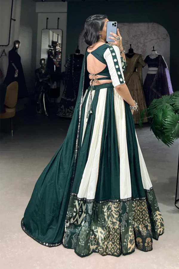 Emerald Green and Ivory Graceful Lehenga with Ethnic Print Borders